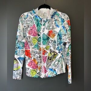 Light weight jacket with jewel/diamond print. Colorful